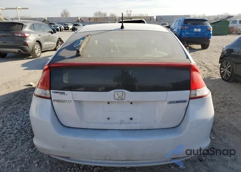2010 Honda Insight Ex z USA, uszkodzony, nr VIN JHMZE2H75AS036373